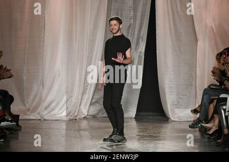 Christian Beck Aigner Creative Director walking on the runway