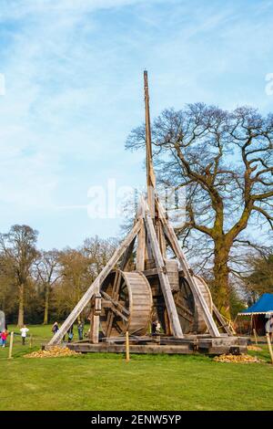 Reproduction of a trebuchet, a medieval siege machine, at Warwick Castle, a 12th century fort and medieval castle Stock Photo