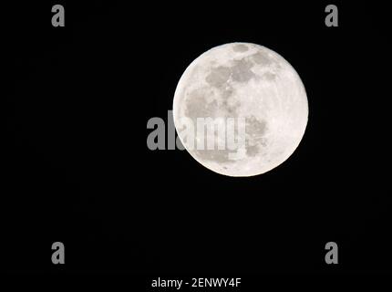 Full moon on black night sky background Stock Photo - Alamy