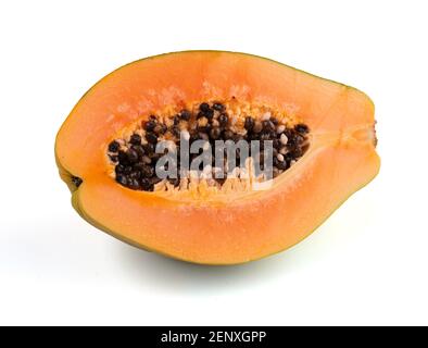 Exotic fruit papaya cut in half on white background Stock Photo