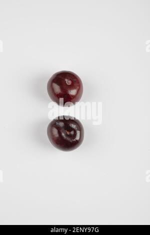 Two cherry plums isolated on white background Stock Photo