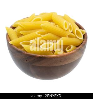 Penne pasta or macaroni in a wooden bowl, isolated on white background. Italian cuisine. Stock Photo