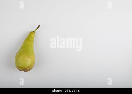 Single whole green pear isolated on white background Stock Photo