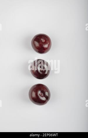 Three cherry plums isolated on white background Stock Photo