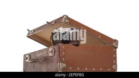 Old suitcase and old camera on white background. Stock Photo