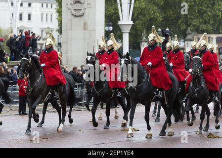 The Queen's Life Guard escort Her Majesty along the Mall as she makes her way from Buckingham Palace to the Palace of Westminster in London on October 14, 2019. The Queen's speech is expected to announce plans to end the free movement of EU citizens to the UK after Brexit, new laws on crime, health and the environment. (Photo by Claire Doherty/Sipa USA)