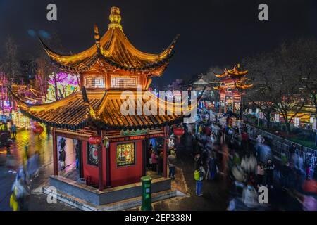 Beijing, China's Jiangsu Province. 26th Feb, 2021. Tourists enjoy light installations and lantern shows at the Fuzi (Confucius) Temple scenic area to celebrate the Lantern Festival in Nanjing, east China's Jiangsu Province, Feb. 26, 2021. The Lantern Festival, the 15th day of the first month of the Chinese lunar calendar, fell on Friday this year. It features family reunions, feasts and various cultural activities. Credit: Li Bo/Xinhua/Alamy Live News Stock Photo