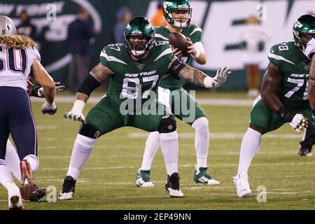 New York Jets guard Chris Glaser (64) reacts against the Atlanta Falcons  during a preseason NFL football game Monday, Aug. 22, 2022, in East  Rutherford, N.J. (AP Photo/Adam Hunger Stock Photo - Alamy