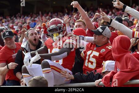 Kansas City Chiefs wide receiver Tyreek Hill (10) jumps into the