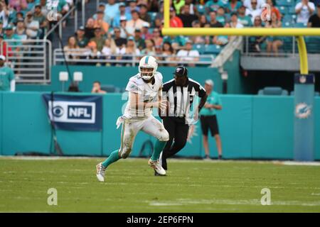 MIAMI GARDENS, FL - NOVEMBER 18: Virginia Cavaliers Wide Receiver Andre  Levrone (14) catches a ball on the field before the start of the college  football game between the Virginia Cavaliers and