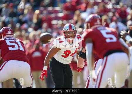 November 9, 2019: DeAngelo Malone #10 Hilltoppers defense lineman glances  to the sidelines for the defensive signal. Western Kentucky defeated  Arkansas 45-19 in Fayetteville, AR, Richey Miller/(Photo by Richey  Miller/CSM/Sipa USA Stock