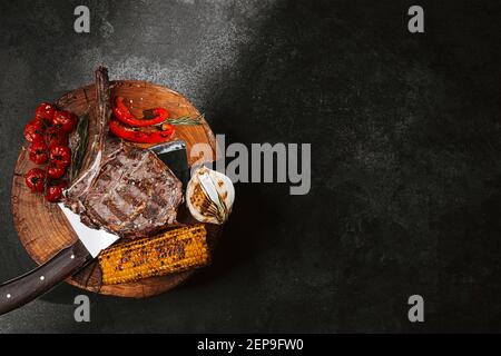 fresh grilled tomahawk steak with vegetables Stock Photo
