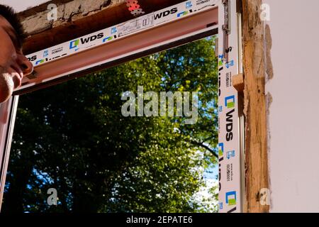 Dolyna, Ukraine July 31, 2020: installation of a plastic window, windows from the wds company, replacement of windows in the house. Stock Photo