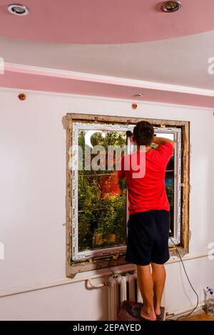 Dolyna, Ukraine July 31, 2020:, windows of the wds company, energy-saving windows, installation of a window in the house. Stock Photo