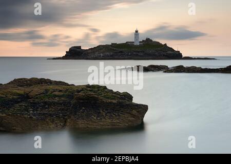 Godrevy Lighthouse which sits on an island off the north coast of Cornwall. Stock Photo