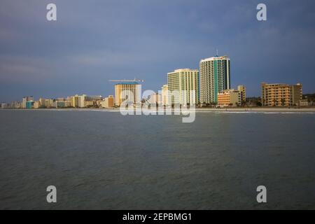 The downtown Myrtle Beach South Carolina skyline as seen from the water looking inland. Stock Photo