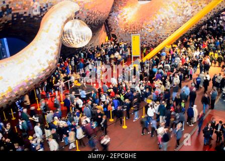 Visitors queue for The Body Zone exhibit inside the Millennium Dome, Greenwich, London, England - 27 November 2000 Stock Photo