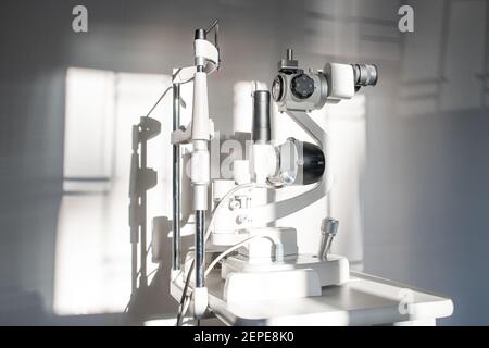 Ophthalmological diagnostic equipment on workplace of clinician inside medical office of contemporary ophthalmic clinics or hospital Stock Photo