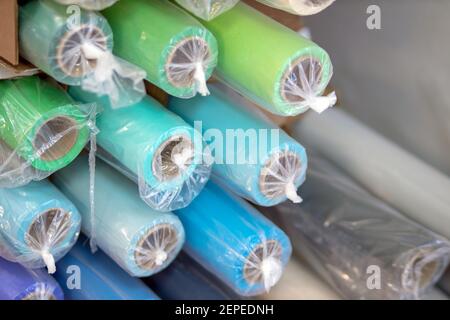 Creative Colorful Background With Rolls Of Color Cardboard. Rolls