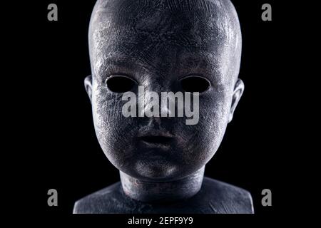 Creepy doll in the dark Stock Photo