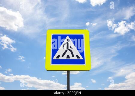 Pedestrian crossing. Square blue and white road sign with walking man ...