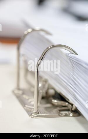 folder with office paper stack. procrastination and paperwork concept Stock Photo