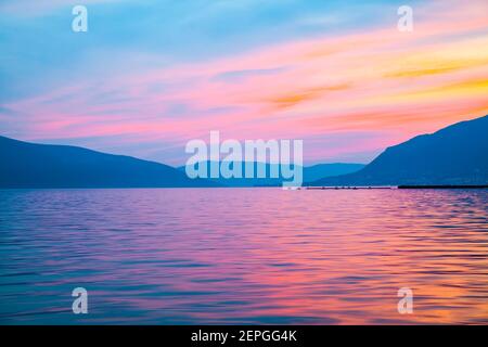 Landscape with The Bay of Kotor of the Adriatic Sea in Montenegro at dusk Stock Photo