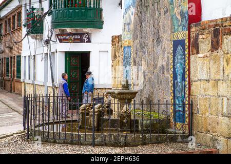 Colombian native people, wearing poncho, Ruana.Artisan sell  Villa de Leyva 500 year old town. Mountain range. Boyaca, Colombia, Andes,South America Stock Photo