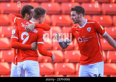 Cauley Woodrow #9 of Barnsley celebrates his goal to make it 1-0 with Carlton Morris #14 of Barnsley  in Barnsley, UK on 2/27/2021. (Photo by Mark Cosgrove/News Images/Sipa USA) Stock Photo