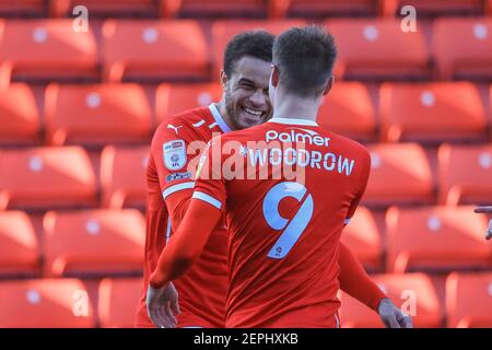 Cauley Woodrow #9 of Barnsley celebrates his goal to make it 1-0 with Carlton Morris #14 of Barnsley  in Barnsley, UK on 2/27/2021. (Photo by Mark Cosgrove/News Images/Sipa USA) Stock Photo