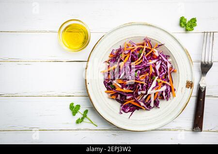 Wooden cabbage grater, piece of cabbage, carrot, assorted pepper and  himalayan salt on cutting board and on blue wooden table. Flat lay with  cabbage f Stock Photo - Alamy