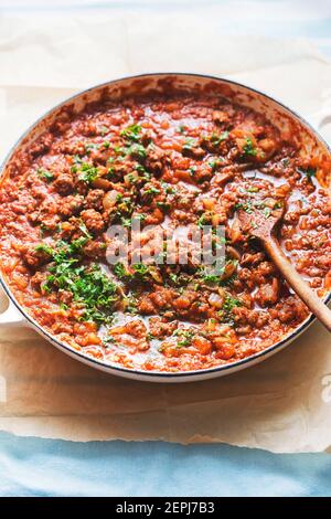 Bolognese beef sauce with tomatoes and parsley Stock Photo