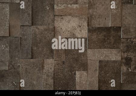 Background made of three-dimensional rectangles in different shades of brown. The rectangles are the same size, but differently raised Stock Photo