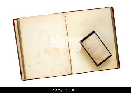 Old book and e-book reader. E- Book, book fair,reading,realaxing,education concept. Isolated, flat lay, free copy space Stock Photo