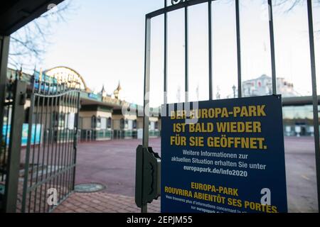 Rust, Germany. 27th Feb, 2021. A sign with the inscription 'Europa-Park will soon be open again for you' hangs on a gate in front of the main entrance of Europa-Park. Due to the worldwide Corona pandemic and related orders by the state government of Baden-Württemberg, Europa-Park is currently closed. Credit: Philipp von Ditfurth/dpa/Alamy Live News Stock Photo