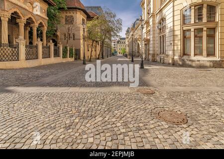 The beautiful Strada Postei street in the Lipscani district, in a moment of tranquility without people, historical center of Bucharest, Romania Stock Photo