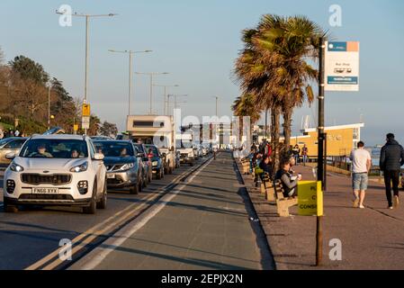 Southend on Sea, Essex, UK. 27th Feb, 2021. The warm sunny weather has attracted visitors to Southend, with the seafront roads especially busy. People are walking the seafront promenades with traffic heavy on Western Esplanade Stock Photo