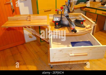 DIY chop saw station in the workshop Stock Photo