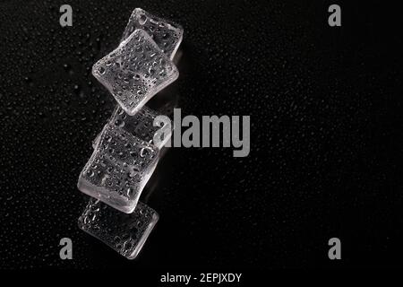 Abstract creative background with ice cubes and water drops. Stock Photo