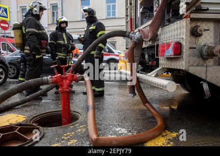 Moscow, Russia. 27th of February, 2021 Firefighters extinguish a fire in an old building on Pyatnitskaya street in the center of Moscow, Russia Stock Photo