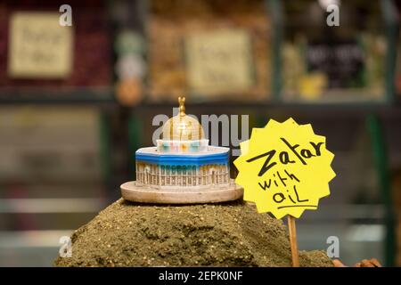 A miniature model of the Islamic shrine Dome of the Rock on a Zatar spice pyramid in a grocery store in Beit Habad also Khan az Zait street at the Muslim Quarter old city East Jerusalem Israel Stock Photo