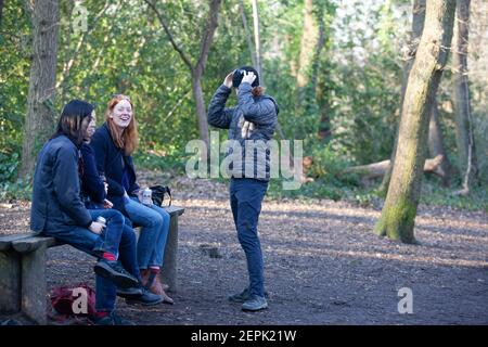 UK Weather, London, 27 February 2021: People and dogs took exercise in Dulwich wetather on a sunny afternoon, although temperatures only reached 12 centigrade. Under coronavirus lockdown regulations one individual may meet another outdoors for exercise and families may exercise within their bubbles. Anna Watson/Alamy Live News Stock Photo