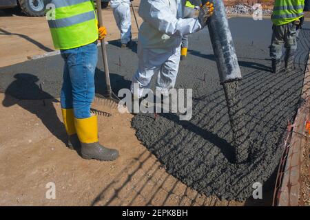 Construction workers are pouring concrete  Stock Photo