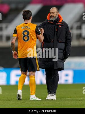 Newcastle, UK. 27th Feb, 2021. Wolverhampton Wanderers Manager Nuno Espirito Santo congratulates Ruben Neves of Wolverhampton Wanderers after the Premier League match between Newcastle United and Wolverhampton Wanderers at St James' Park on February 27th 2021 in Newcastle, England. (Photo by Daniel Chesterton/phcimages.com) Credit: PHC Images/Alamy Live News Stock Photo
