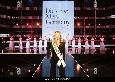 Rust, Germany. 27th Feb, 2021. Anja Kallenbach, Miss Germany 2021 stands on stage shortly after her election. 16 candidates from all federal states faced the predominantly female jury for the election of Miss Germany 2021. The motto was #EmpoweringAuthenticWomen. According to the organizers, the competition should no longer be primarily about beauty, but about the ability to motivate others and send an individual message. Credit: Philipp von Ditfurth/dpa/Alamy Live News Stock Photo