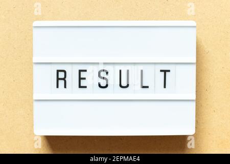 Lightbox with word result on wood background Stock Photo