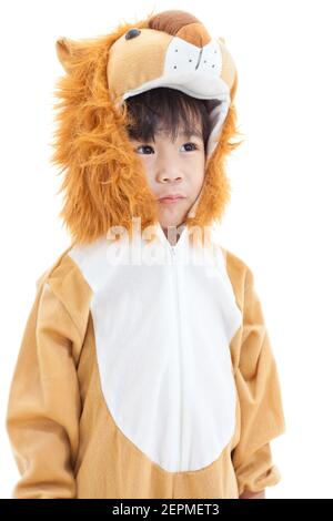 Little lovely asian boy costumed like a lion and looking ahead, shot in studio, isolated on white background Stock Photo