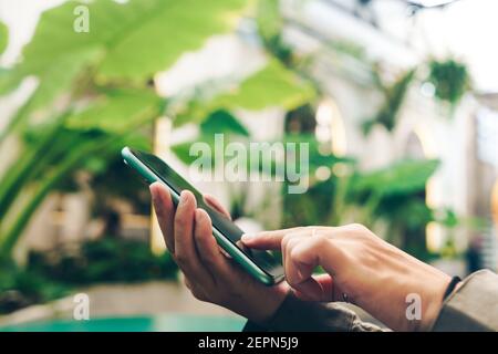 Woman hand using smartphone to do work business, social network, communication concept. Stock Photo