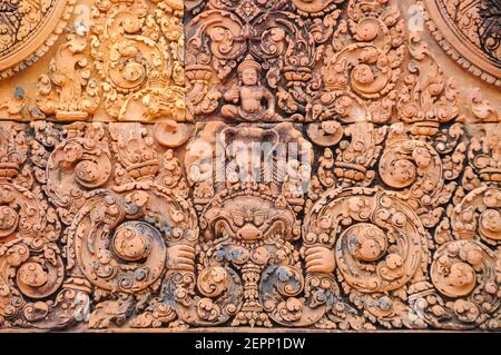 Detail of lintel at Banteay Srei, Angkor, Cambodia, showing Indra riding on Erewan (three-headed elephant). Stock Photo
