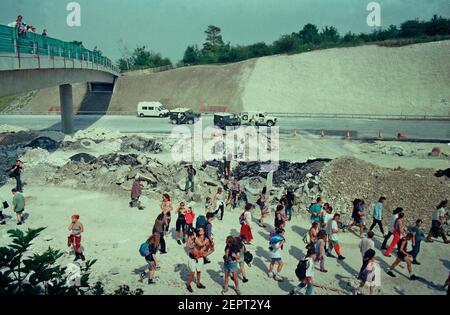 A large demonstration at Twyford Down, Hampshire, the site of a large anti road protest against the construction of the M3 motorway extension through two Scheduled Ancient Monuments & an Area of Outstanding Natural Beauty. The demonstration, on 2nd July 1994, also raised awareness of the impending Criminal Justice Bill, that criminalised peaceful protest Stock Photo